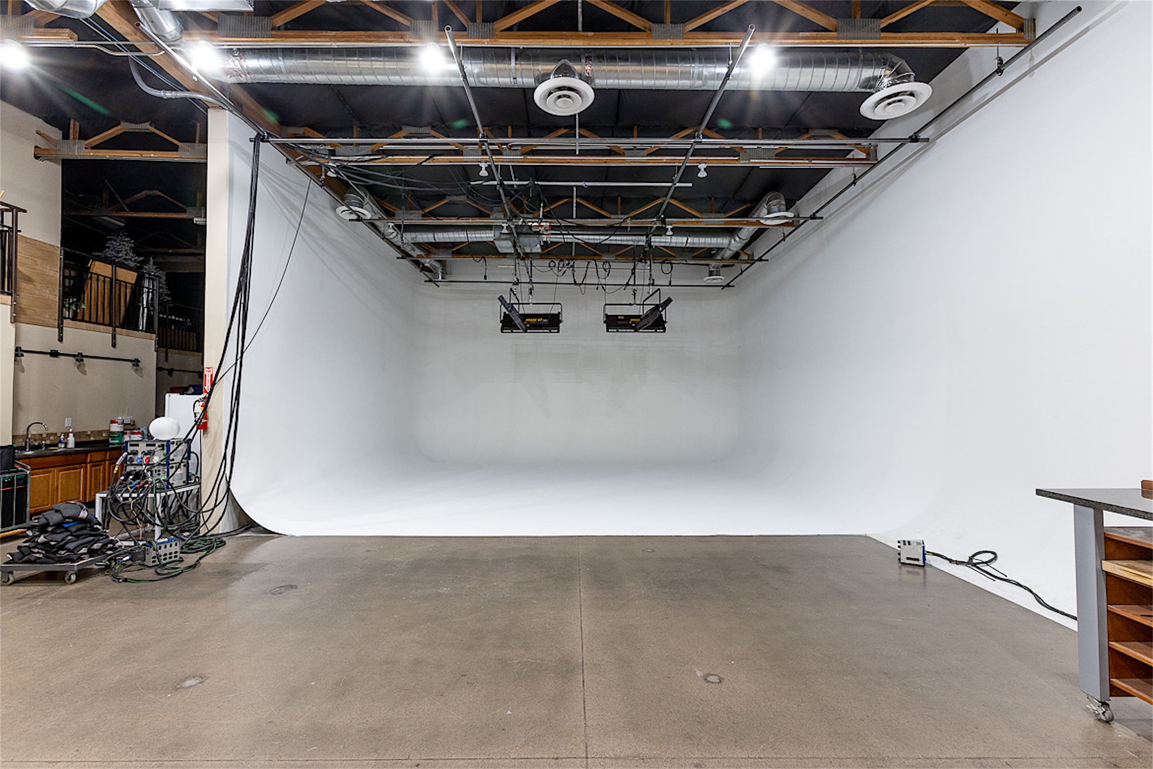 Studio 2 — three-walled high-key cyclorama at Loft 19